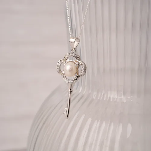 collar llave perla plata